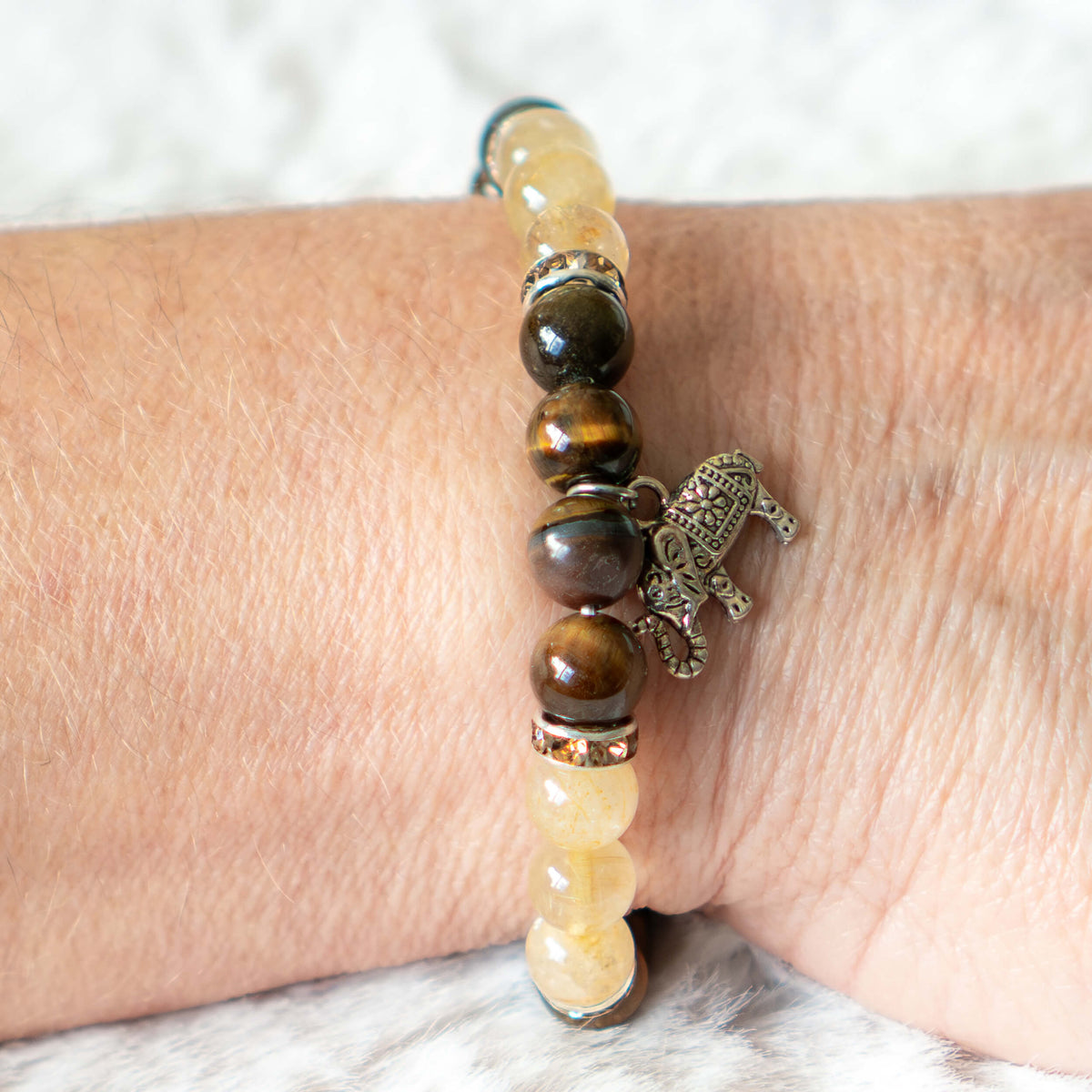 Armband Tigerauge/Rutilquarz mit Elefant
